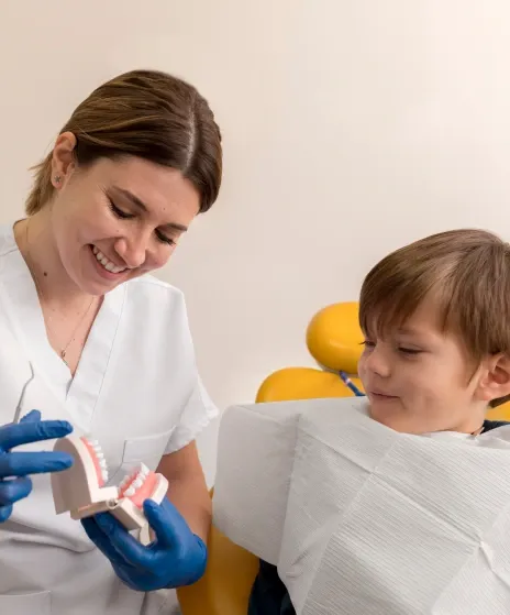 Smiling Child Receiving Top Dental Care
