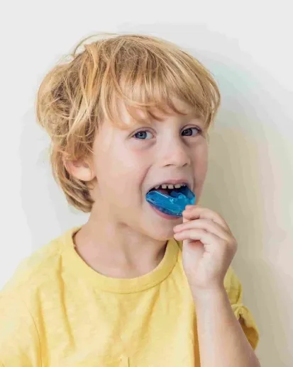 Smiling Child with Mouth Guard