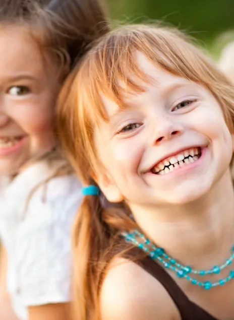 Smiling Child Receiving Top Dental Care