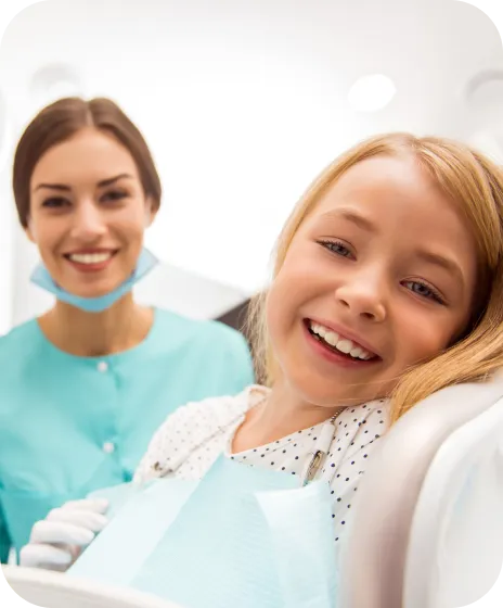 Smiling Child Receiving Top Dental Care